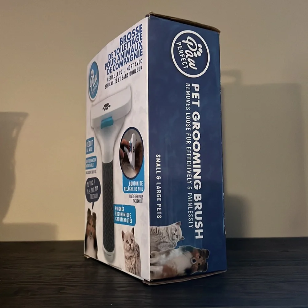Paw perfect pet grooming brush